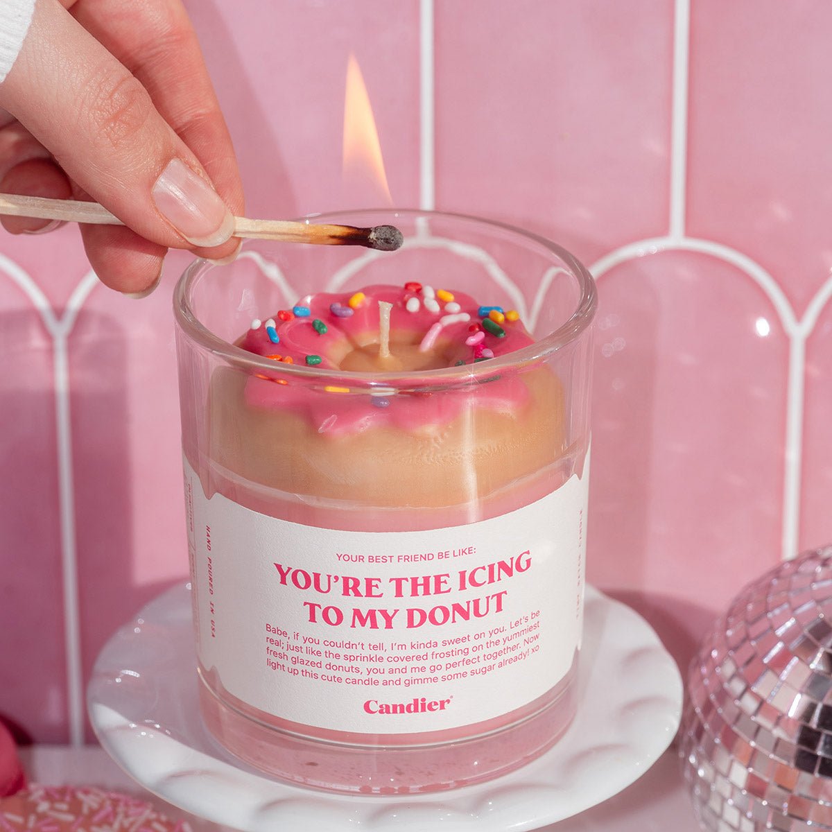 Candier strawberry donut dessert candle being lit, showcasing realistic wax donut detail and cozy romantic Valentine’s Day candle vibes