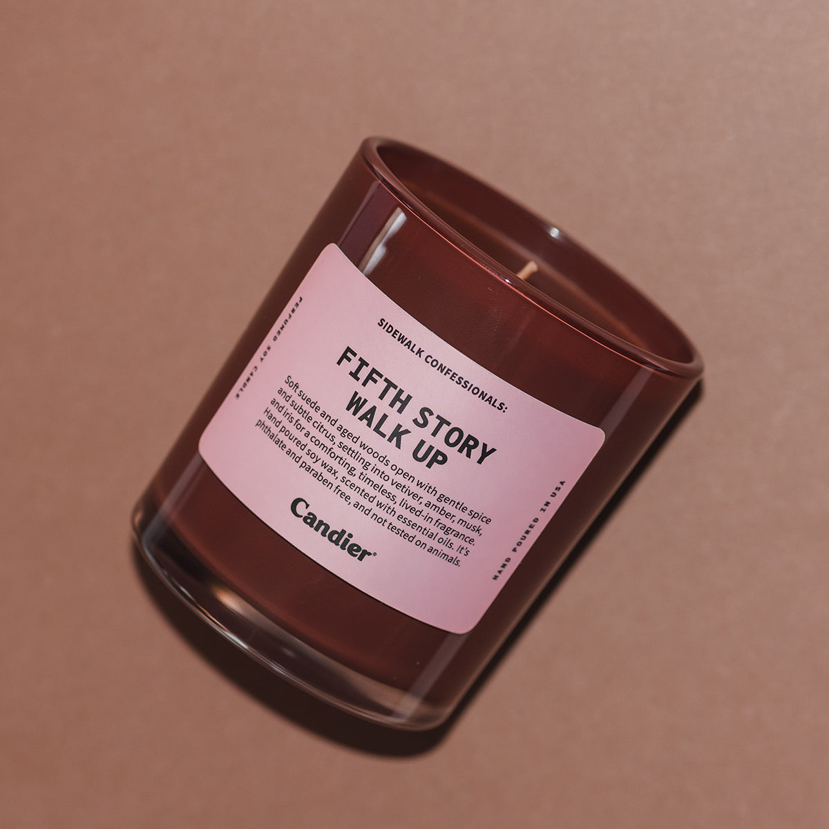 Candier Fifth Story Walk Up candle flat lay, cute candles and luxury candles with warm cozy NYC aesthetic