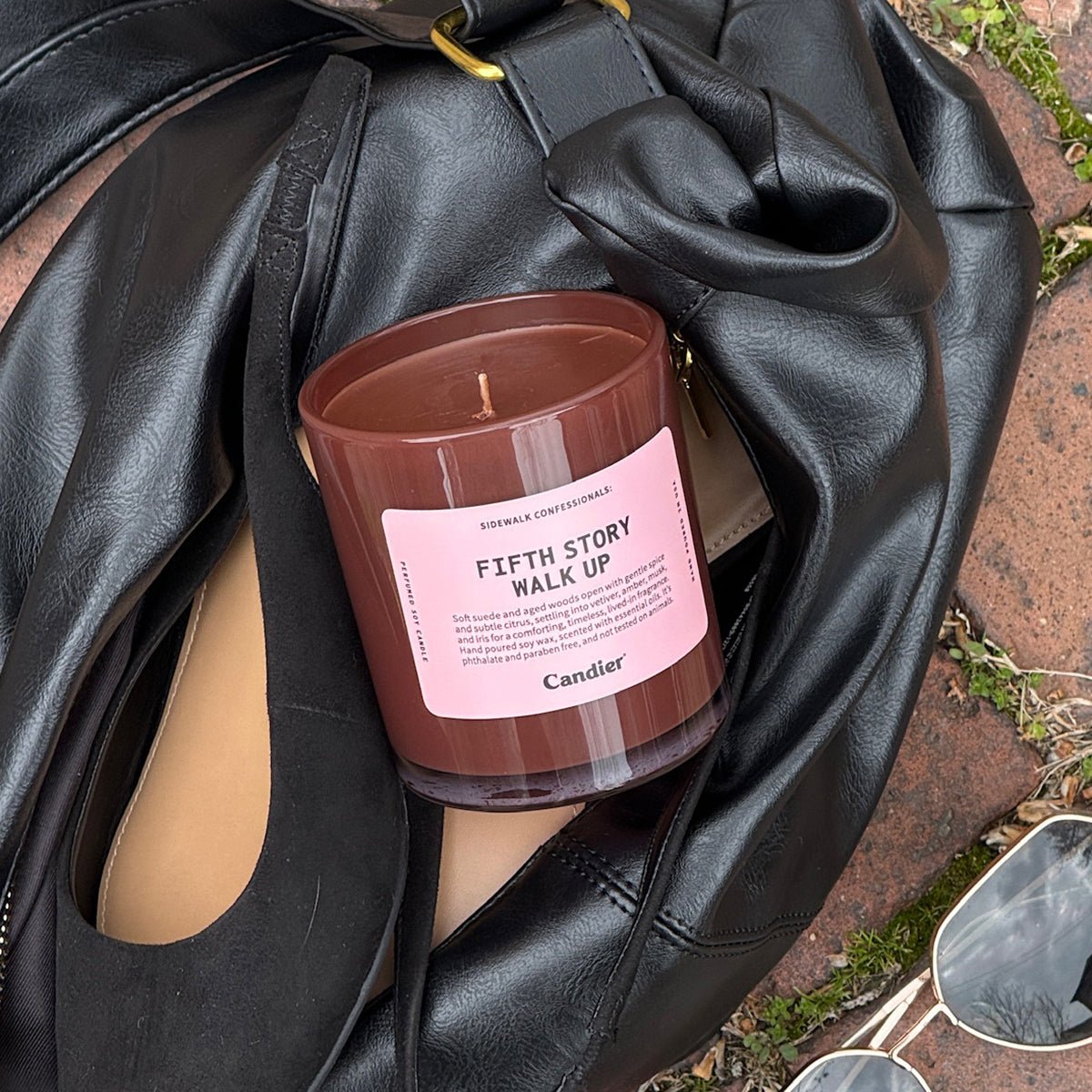 Candier Fifth Story Walk Up candle lifestyle, cute gifts for her and luxury candles with warm woody scent