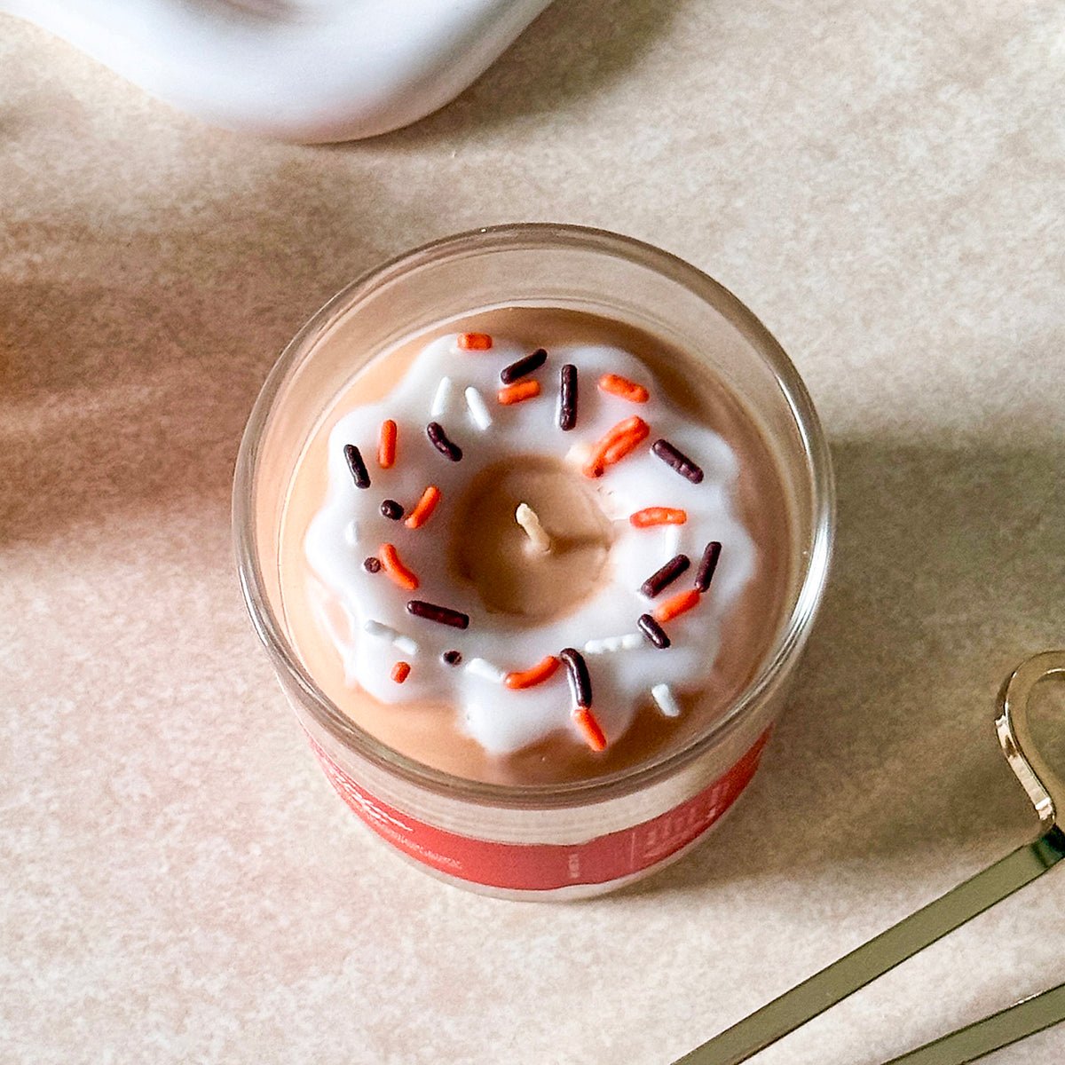 Candier pumpkin spice candle with sprinkles donut topper, luxe fall dessert candle hand-poured in USA.