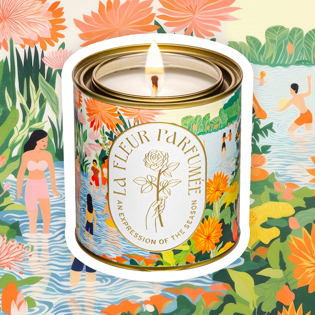 Tropical aesthetic luxury candle lit with floral background – best summer soy candle with modern spring scent trends hotel lobby candle
