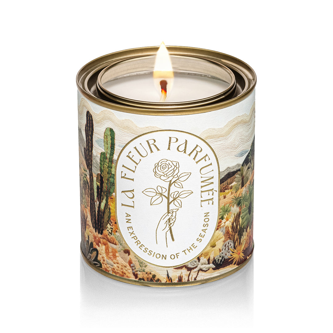 Luxury desert candle in tin vessel with hand-poured soy wax, inspired by earthy scents and desert aesthetic.