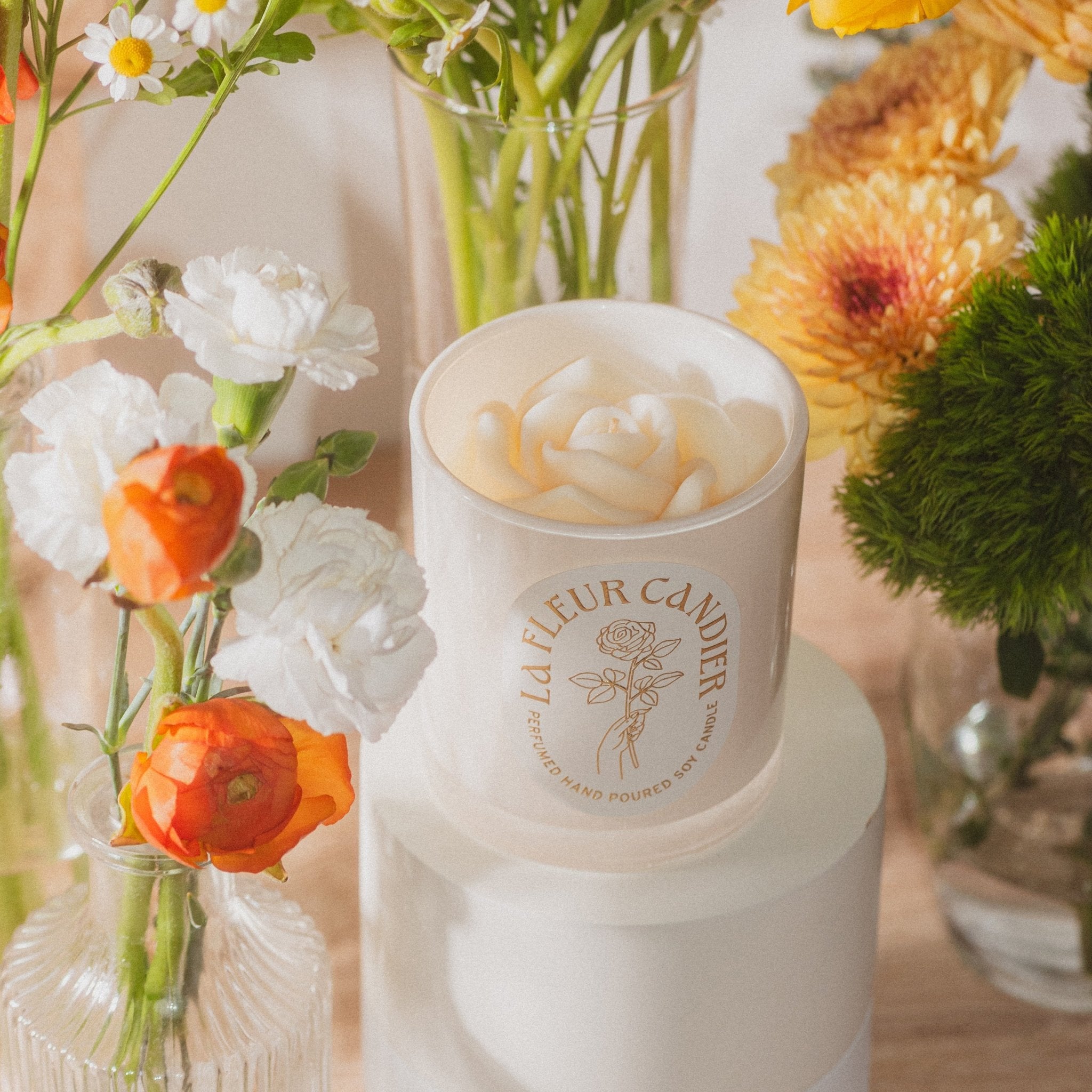 Fleur de Oranger flower candle styled with fresh blooms, a floral candle with soft citrus floral scent and cute gift for her