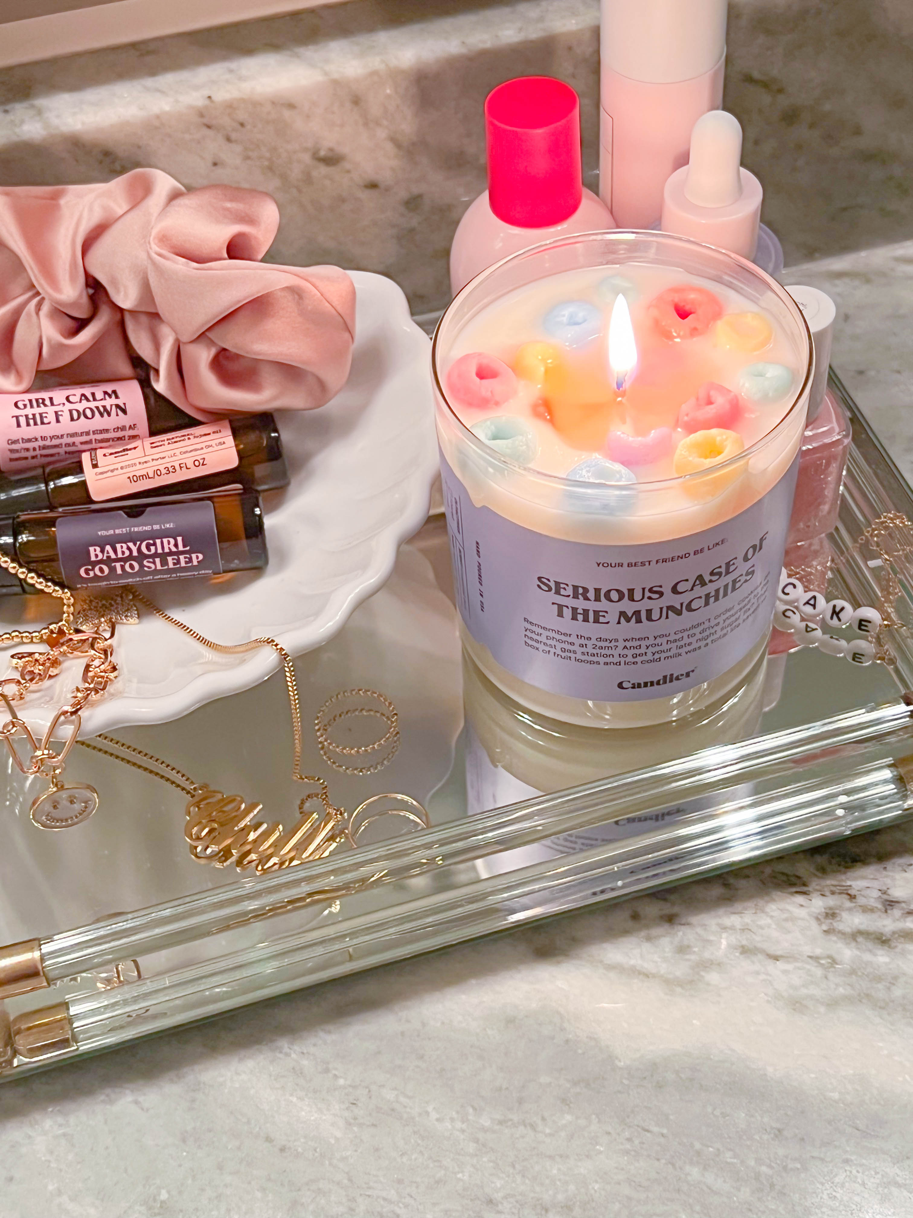 candier cereal candle with realistic fruit loop detail on cute dresser 